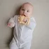Mushie Kézre húzható rágóka - Napocska
