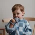 Mushie Kézre húzható rágóka - Dinó